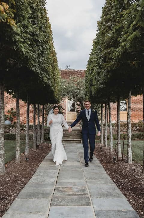 a man and woman kissing in a field