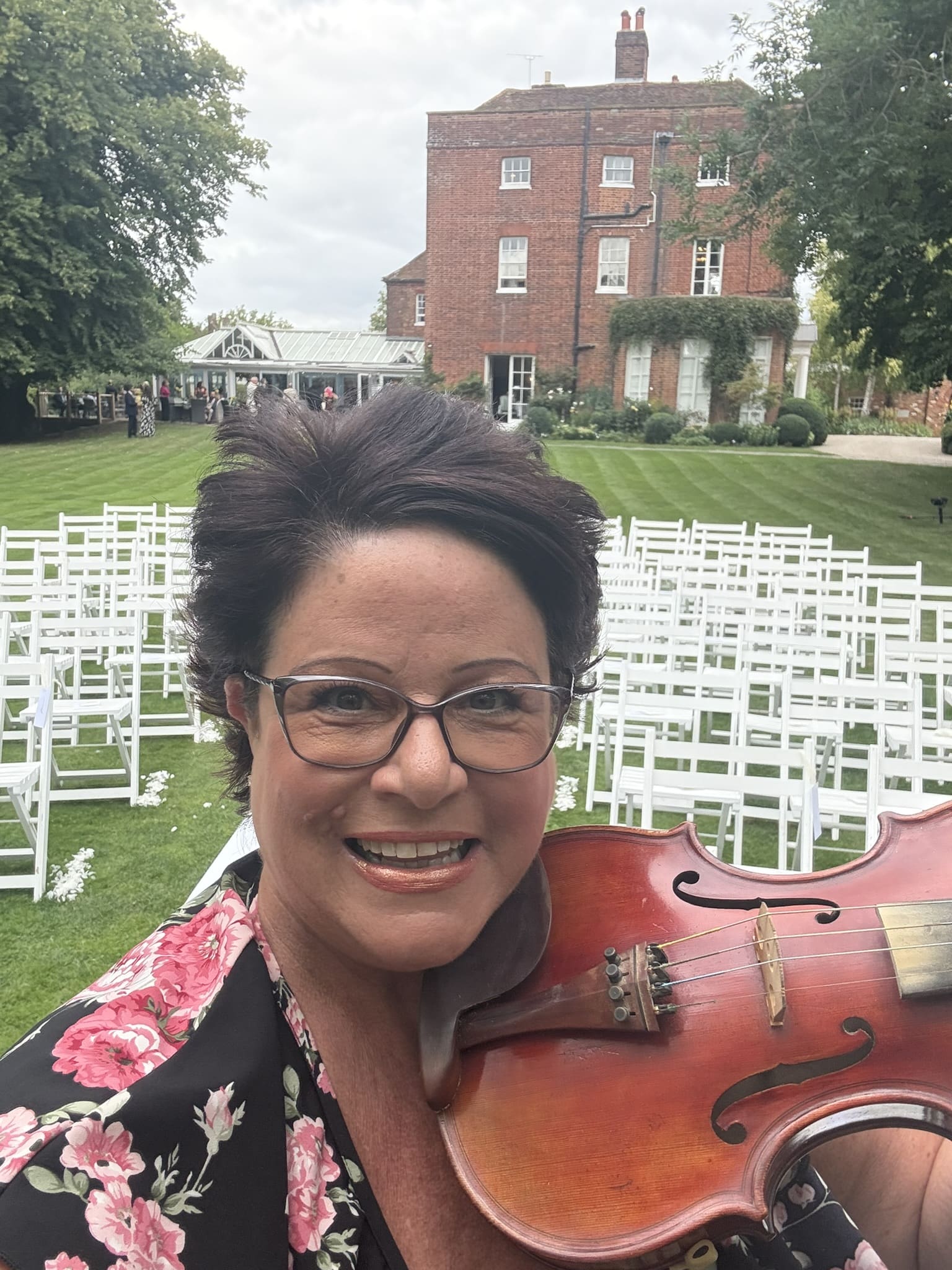 a man and woman kissing in a field