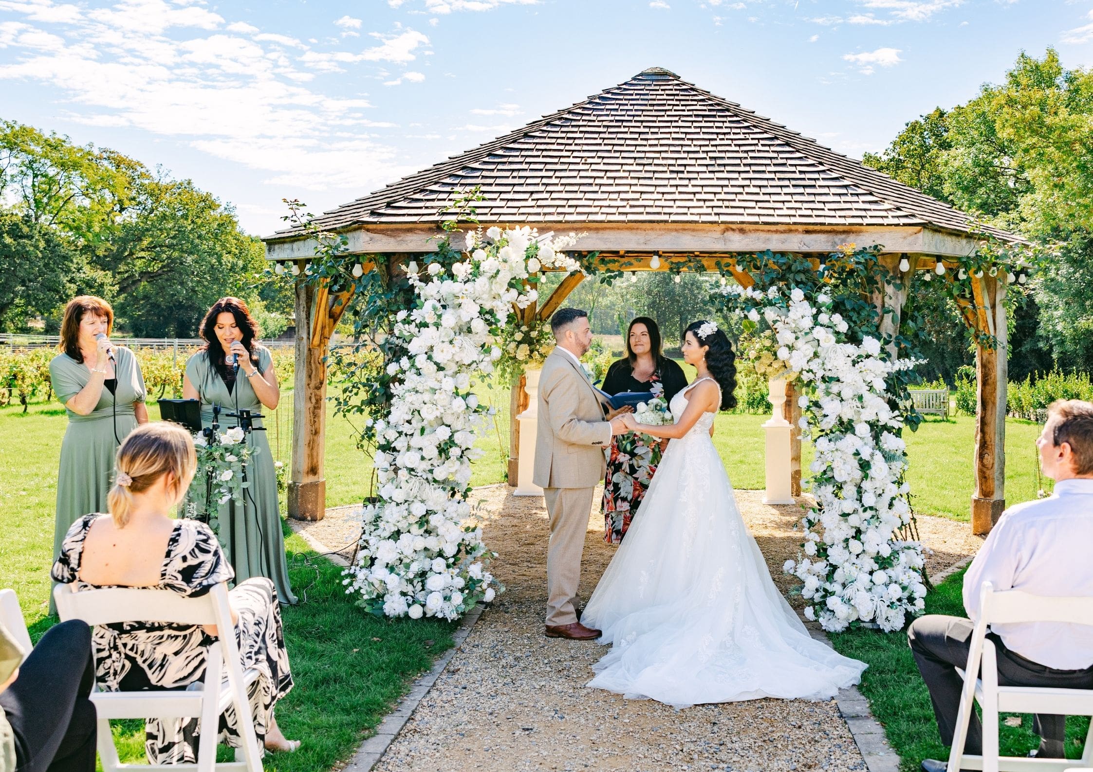 a man and woman kissing in a field