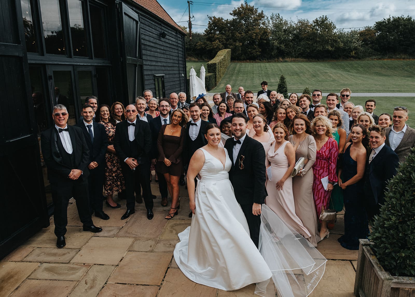a man and woman kissing in a field