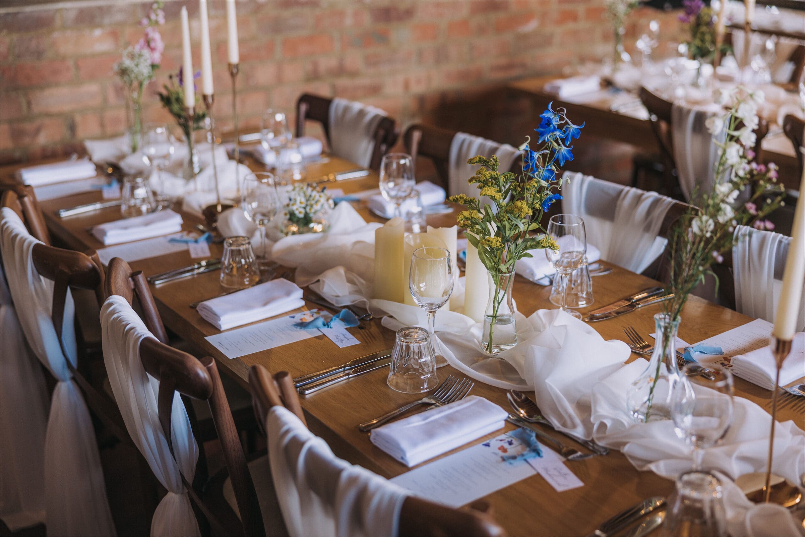 a man and woman kissing in a field